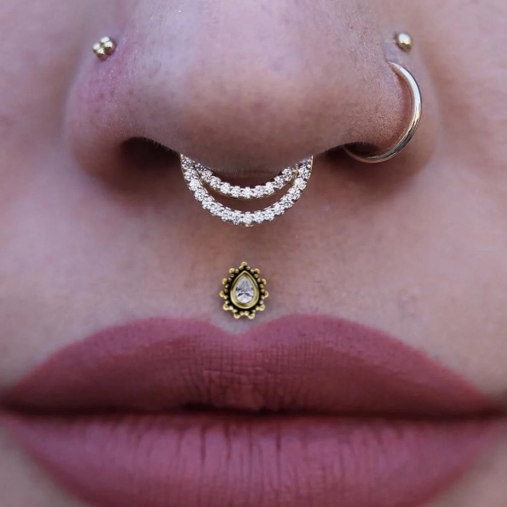 Gold Medusa teardrop gem labret